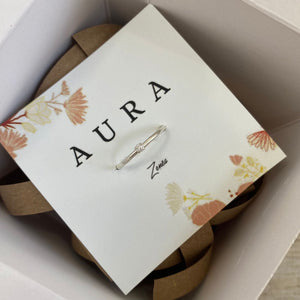 Abril - Aura