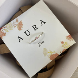 Junio - Aura